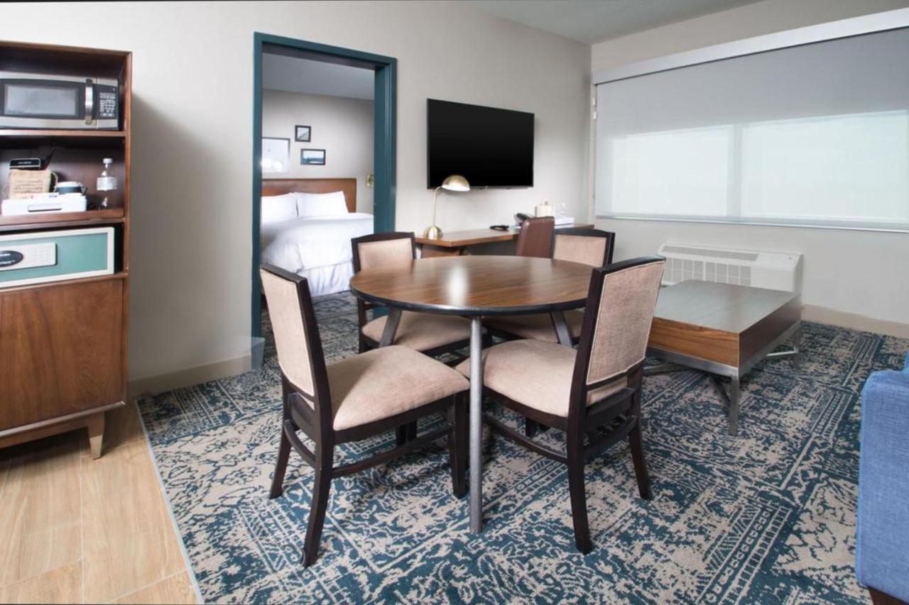 Newly Designed Junior King Suite with Roll-In Shower - Mobility Accessible